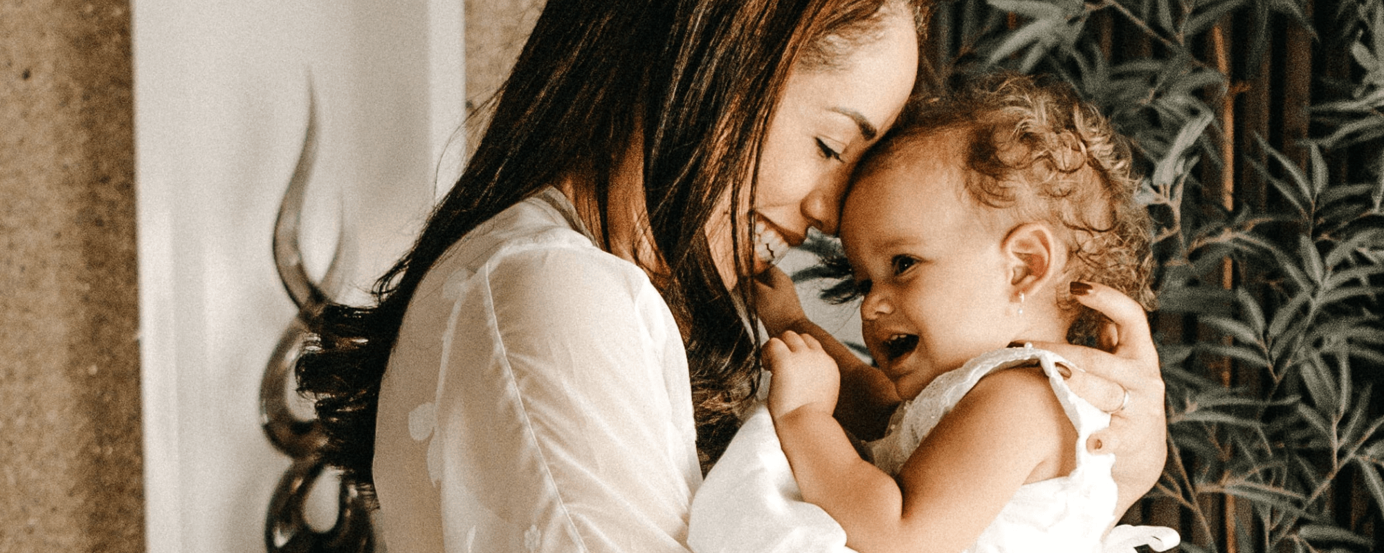 mom holding toddler